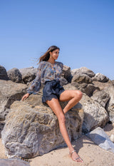 GOLDEN SYMPHONY - HIGH WAIST LINEN SHORTS WITH EMBROIDERED HEM AND STATEMENT BELT Scarlett Poppies Shorts